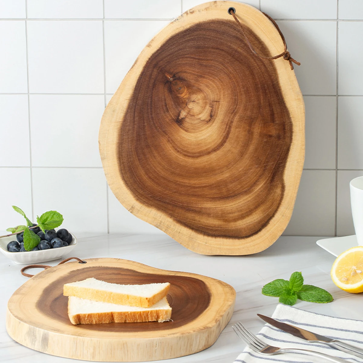 Irregular shape cutting board for bread and fruit, made from a single piece of rosewood