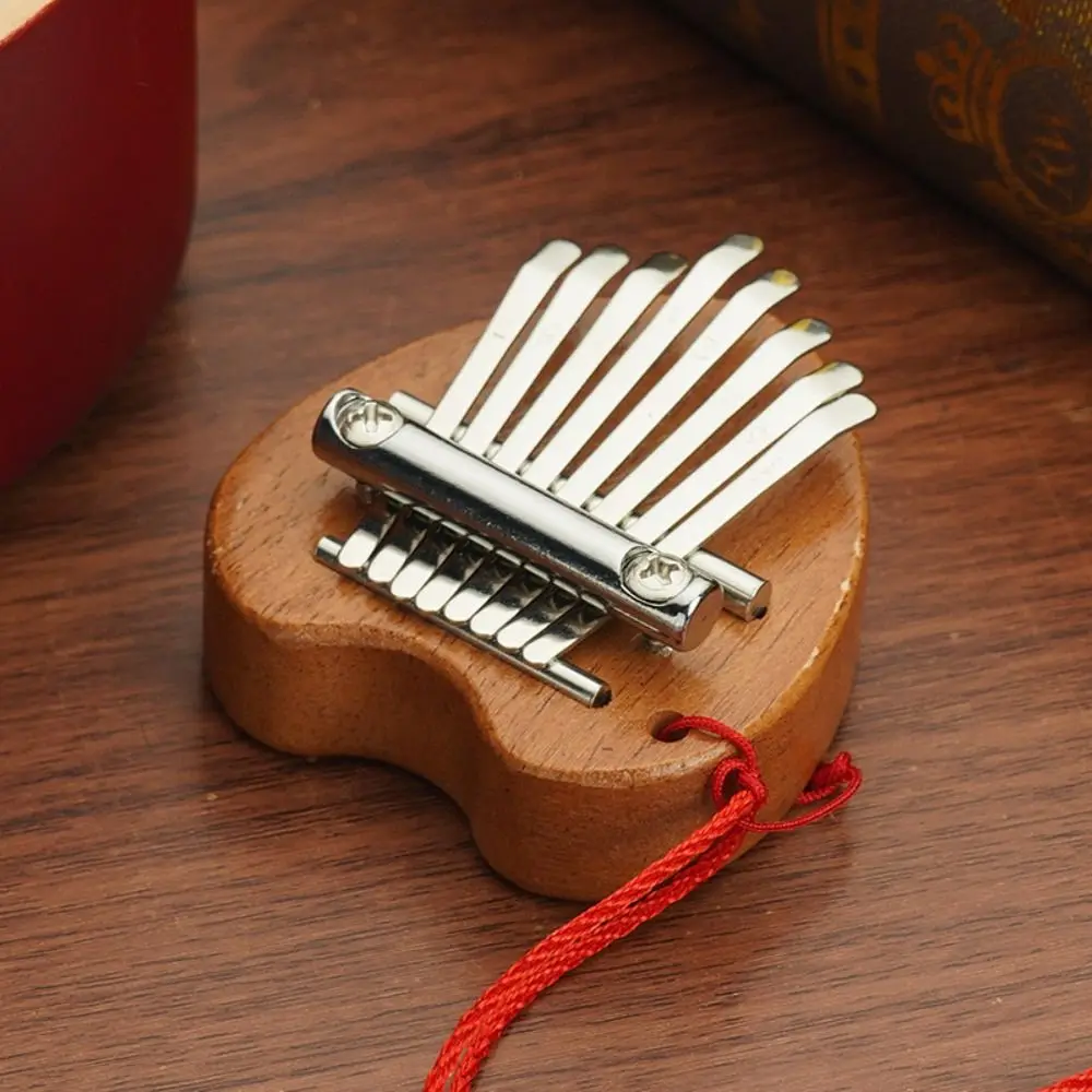 Finger Harp Mini Finger Piano Easy-to-Learn Marimba Thumb Piano Necklace Exquisite Portable Hand Piano Adult