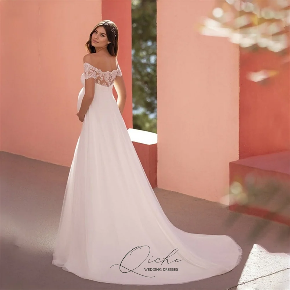 ชุดแต่งงานทรงเอไลน์สำหรับหญิงตั้งครรภ์ ดีไซน์ลูกไม้หรูหรา แบรนด์ QICHE แบบเปิดไหล่ สายเดี่ยว เปิดหลัง รุ่น Vestidos De Novia ปี 2026 รับตัดตามสั่ง