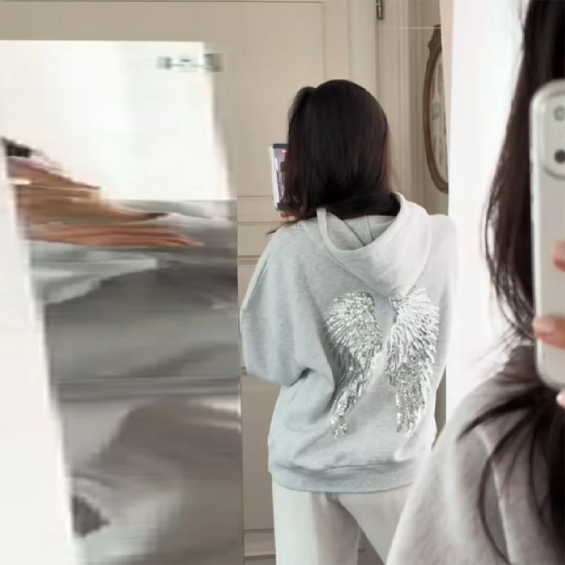 المرأة مطرزة الجناح طباعة نمط هوديي الخريف موضة الكلاسيكية مقنعين البلوز 2025 فضفاض أنيق تنوعا الدافئة البلوز