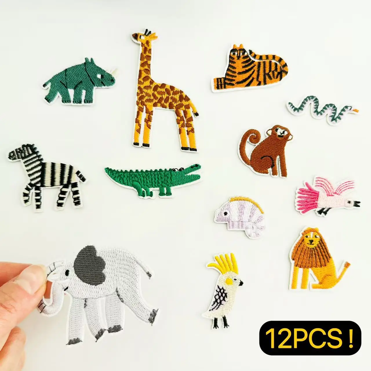 แพทช์ปักลายสัตว์ป่าเขตร้อน 12 ชิ้น – ลายสิงโต จระเข้ ยีราฟ ช้าง ม้าลาย สำหรับติดเสื้อผ้า กระเป๋า DIY