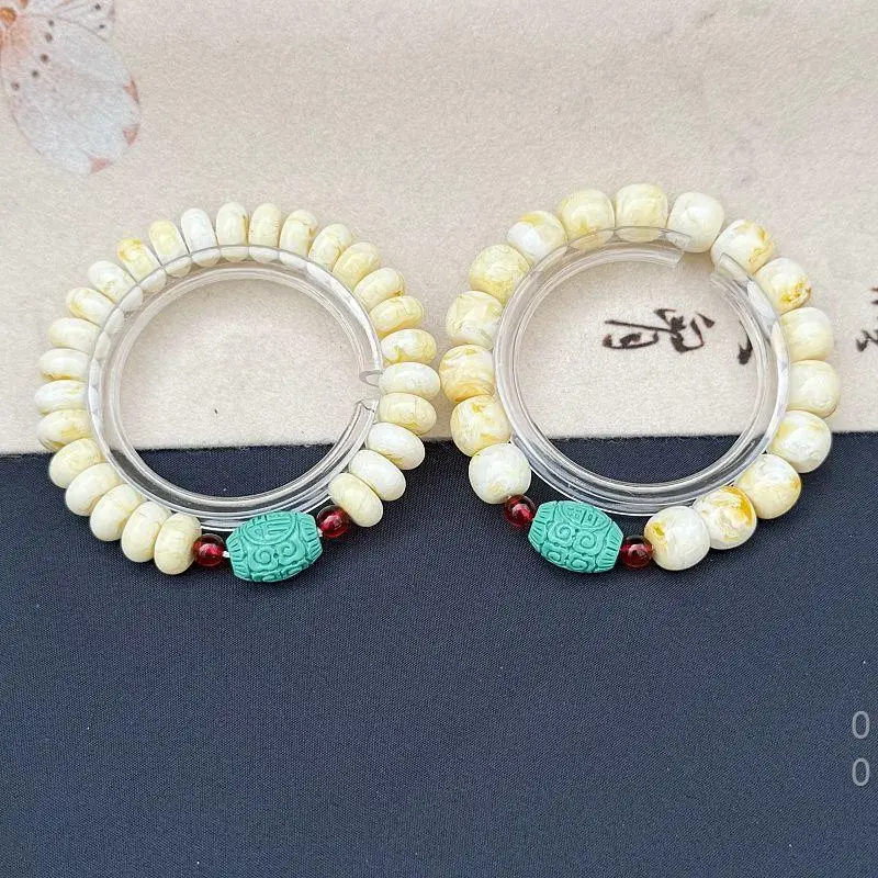 white , Yao Hua yellow amber disc bead bracelet, vintage 10*12mm, gold porcelain apple beads