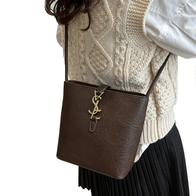 

Premium sense of fashion bag female 2025 new retro hundred with bucket bag personality niche design crossbody bags