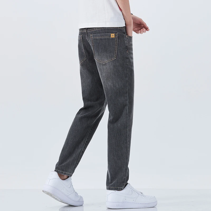 Pantalones vaqueros finos de seda de hielo a la moda, ropa de verano para hombre, nuevos pantalones rectos ajustados elásticos, pantalones vaqueros de algodón informales de negocios