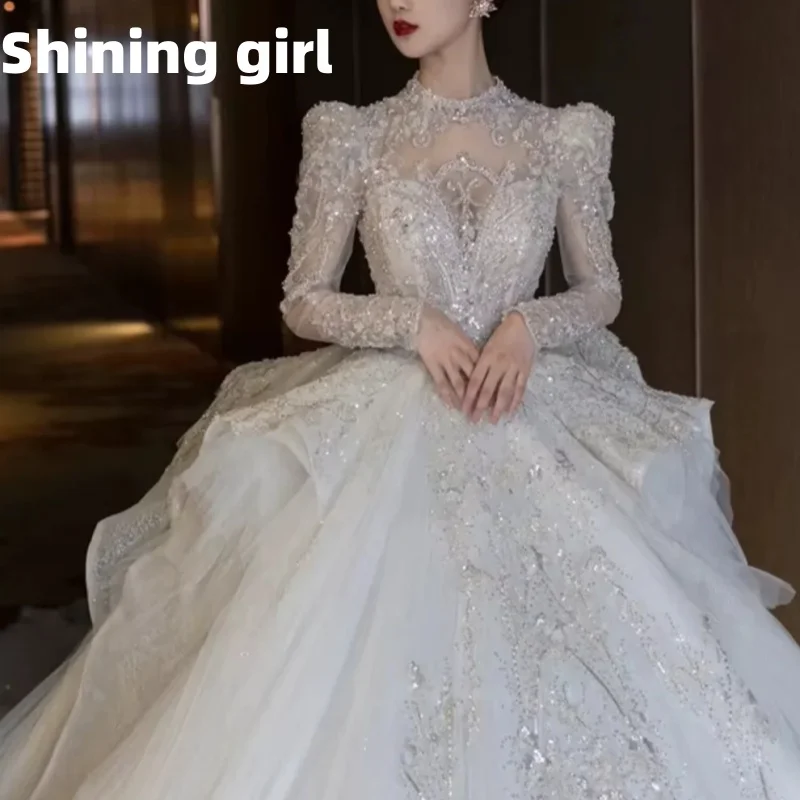 فستان زفاف عتيق فاخر طويل القطار 2025 فساتين زفاف جديدة ثوب حفلة كم طويل شتوي مطرز بالخرز فساتين زفاف مخصصة