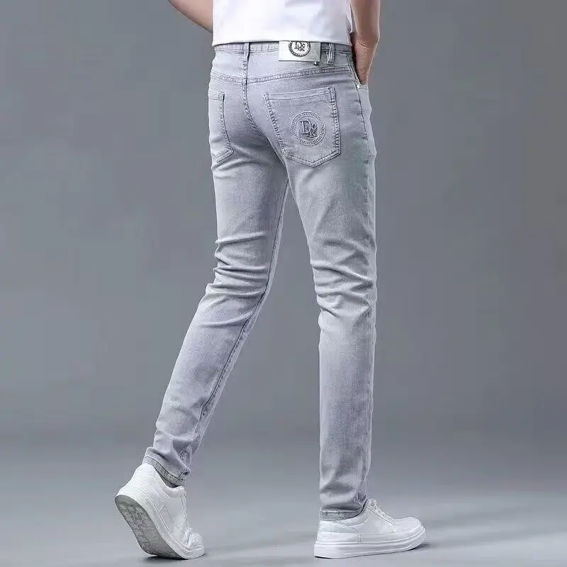 

2025 Men's Slim fit Denim Pants High-quality Casual Fashion Exquisite Steel Print Pattern Suitable Youth Couples