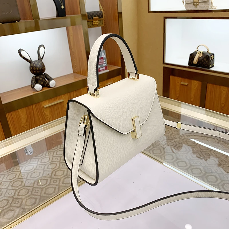 2024 New Genuine Leather Kelly Bag Niche Design Fashionable and Simple Lock Hand-held Shoulder Crossbody Bag for Women