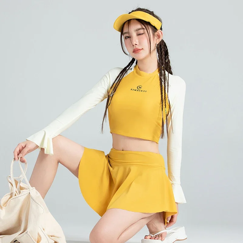 ملابس السباحة النسائية المحافظة 2 قطعة ملابس الشاطئ الكورية ثوب السباحة مجموعة صفراء طويلة الأكمام انقسام بيكيني مع التنانير Tankini مجموعات