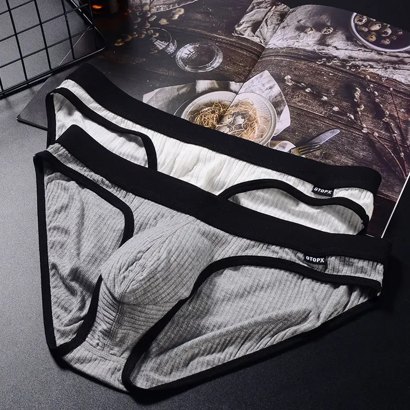 New single piece men's threaded fabric breathable sexy underwear with large pockets U convex quick drying triangle pants