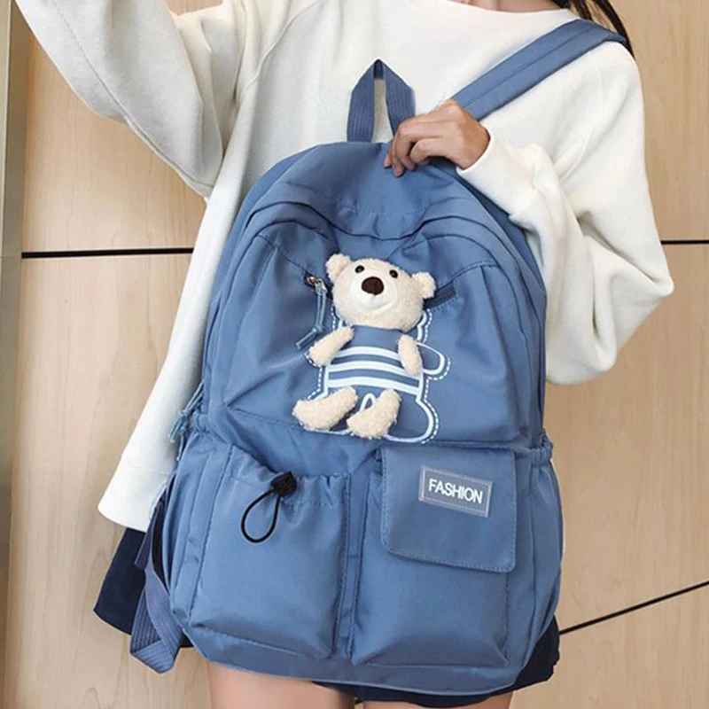 Trendiger „FASHION“-Label-Rucksack für tägliche Ausflüge zum Pendeln, stilvoller Bärendetail, mehrfarbig, leicht, lässig, geräumige Tasche