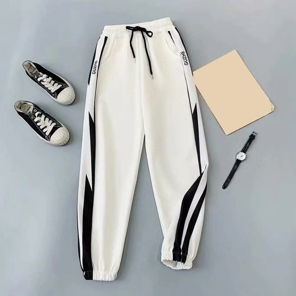 Pantaloni sportivi con coulisse in colore a contrasto in stile coreano per uomo pantaloni larghi pantaloni da jogging autunnali pantaloni Streetwear maschili hombre