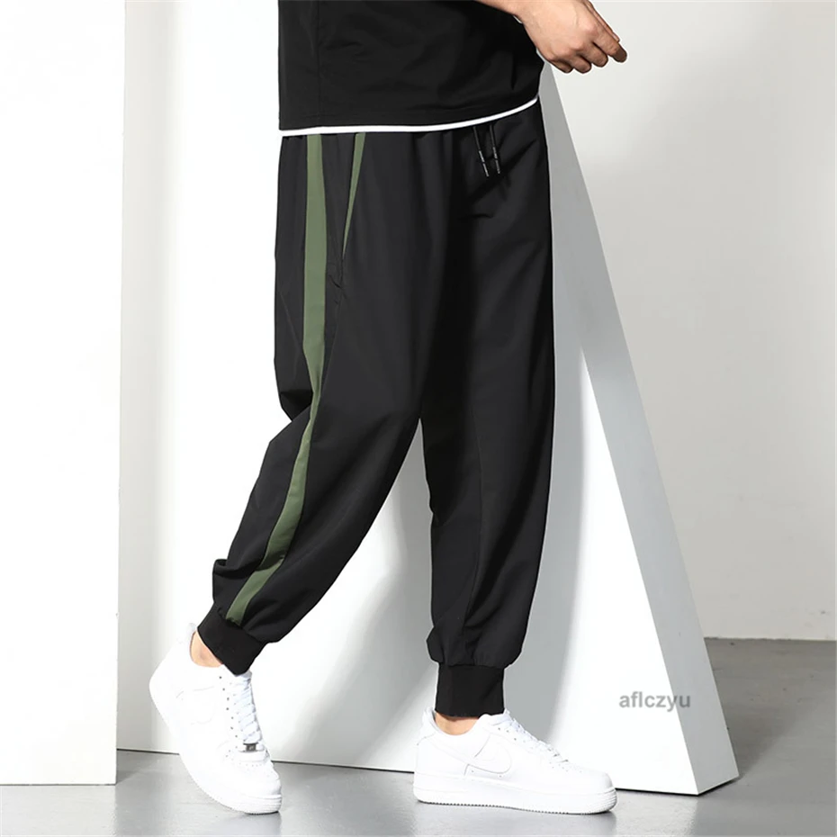 Schwarze Jogger hose Männer Sommer Baggy Hose plus Größe 6xl Mode lässig Patchwork Hose männlich unten groß 6xl