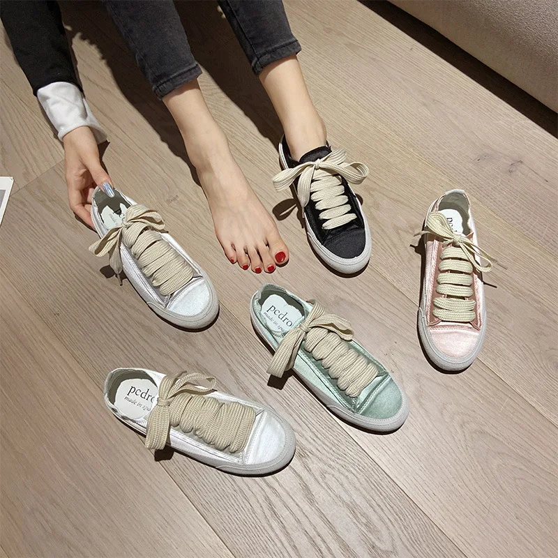 Zapatos planos blancos satinados para mujer, zapatillas informales de lona a la moda, novedad