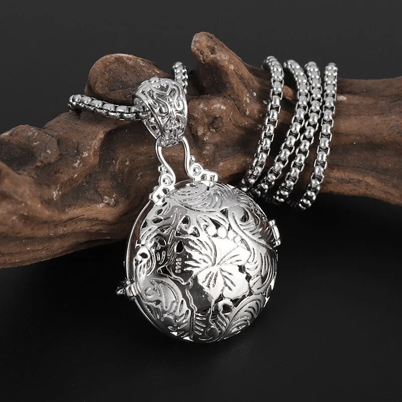 This hot-selling necklace features an open design, adorned with incense-scented balls, intertwined patterns, and a pendant.
