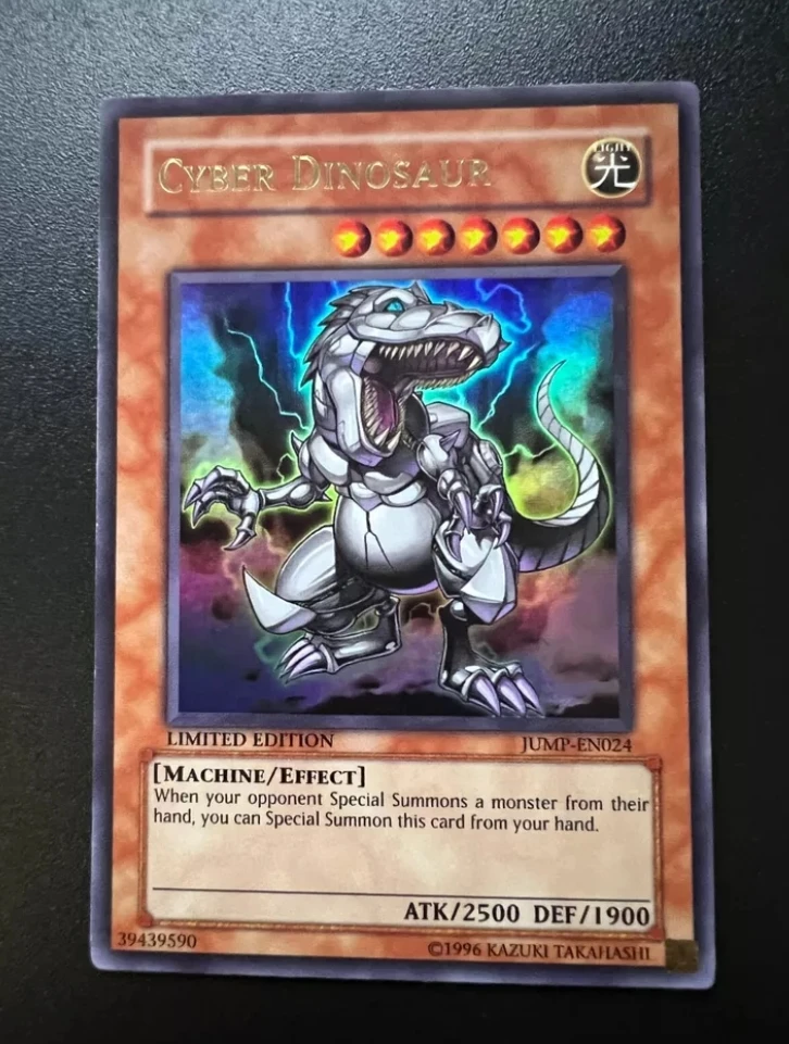 

Yugioh KONAMI Duel Monsters JUMP-EN024 Cyber Dinosaur Ultra Rare English Limited Edition Collection Mint Card