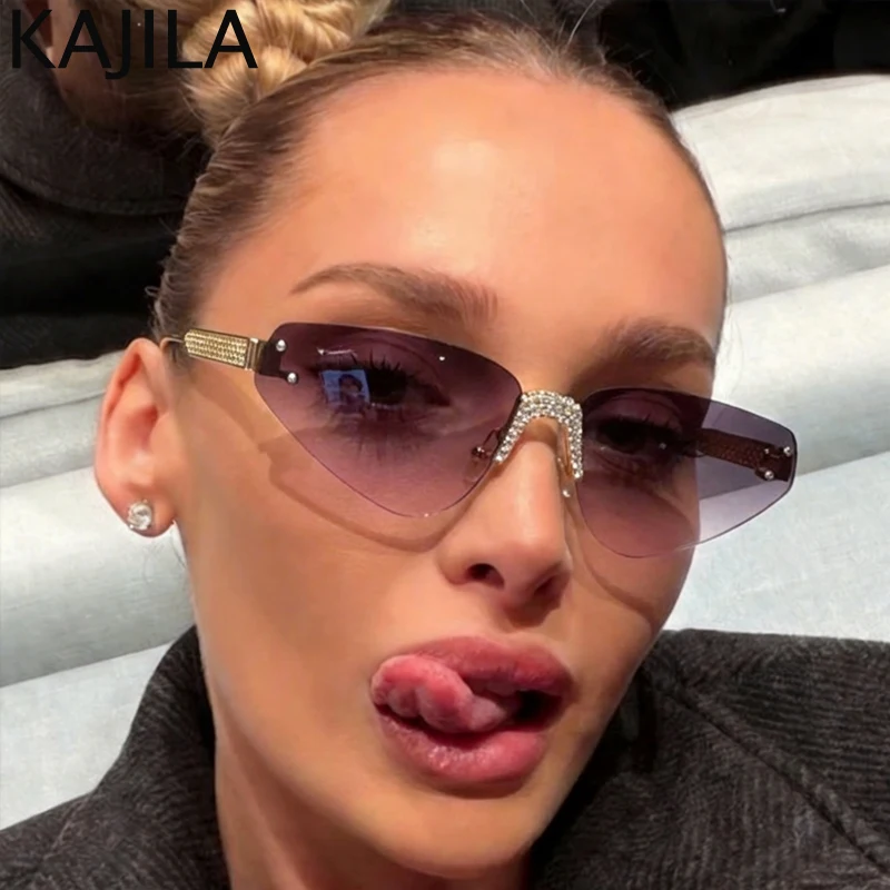 

Sexy Cat Eye Rimless Rhinestones Sunglasses Women 2026 Luxury Brand Retro Punk Sun Glasses For Ladies Trendy Metal Frame Shades