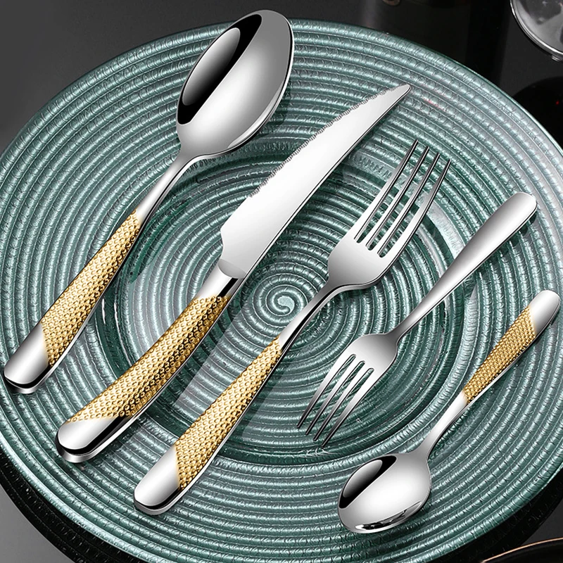 Juego de cinco piezas de cubiertos occidentales de acero inoxidable con mango redondo de estrella y diamante, que incluye cuchillo, tenedor, cuchara y tenedor para postre.