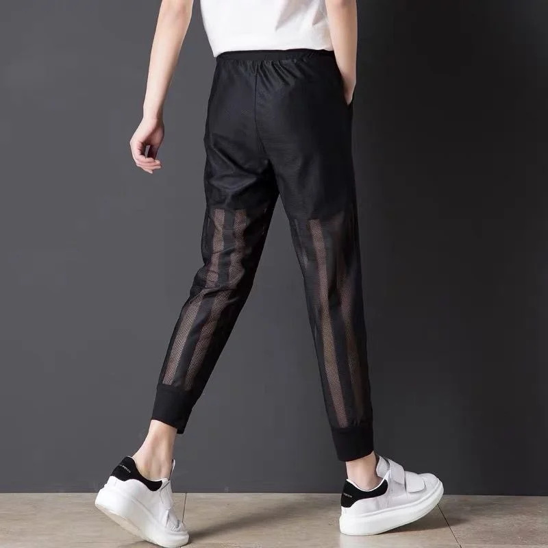 Pantaloni Harem in rete Sexy a vita alta da donna 2023 pantaloni da jogging in Chiffon di moda Patchwork pantaloni sportivi trasparenti pantaloni Casual Streetwear