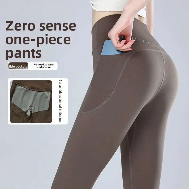 Naked fitness trousers women's smile line hip lift sports leggings women's outdoor high waist seamless nine-point yoga pants