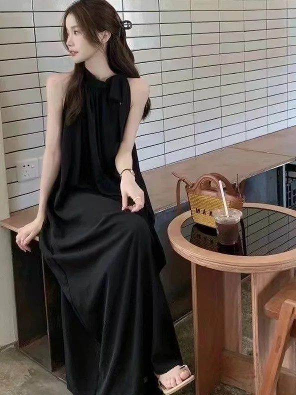 

French off shoulder vest dress for women in summer with a new strap design that exudes a slimming and vacation style long skirt