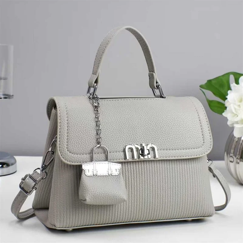 

2025 Новая высококачественная женская кожаная сумка через плечо, роскошный бренд, известный дизайнер, элегантная винтажная винтажная сумка Paris Premium Vibe ​