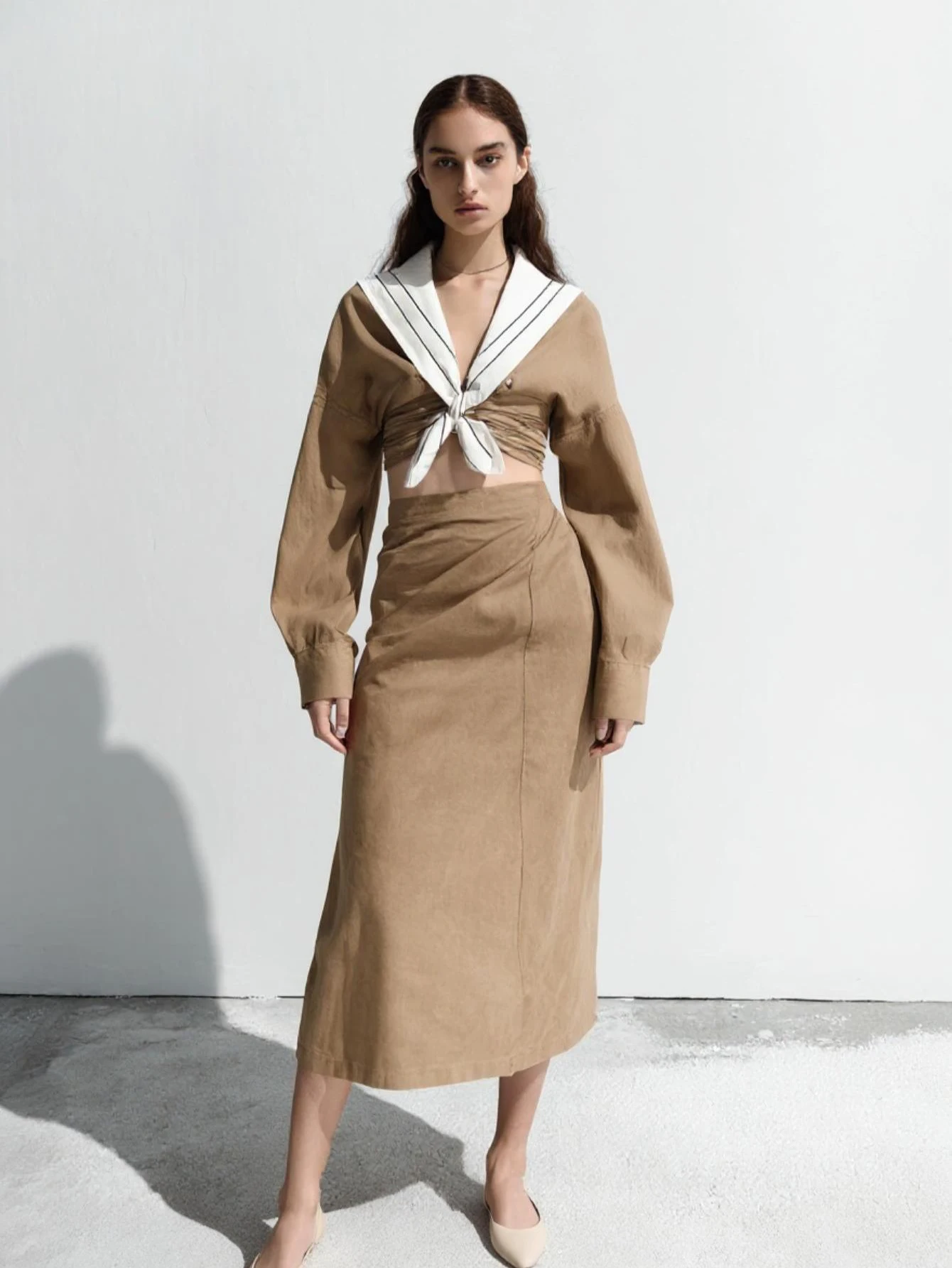 تنورة رصاص عالية الخصر للنساء بقصة ضيقة وعصرية بحافة خس عادية تحت الركبة