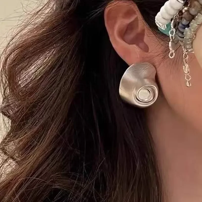 Simple irregular vacation style abstract shell stud earrings 925 silver needle retro matte old feeling conch earrings women