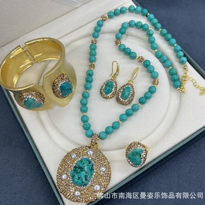 

turquoise rough stone inlaid pearl four-piece set versatile popular jewelry clay inlaid jewelry wholesale pendant earrings ring
