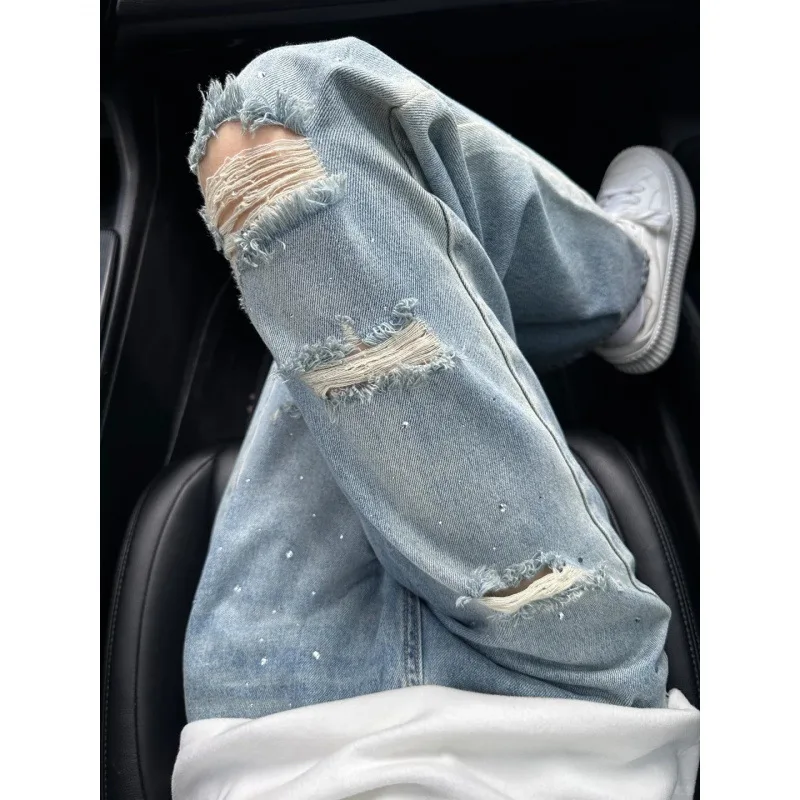 جينز نسائي بتصميم أمريكي مزين بأحجار الراين الثقيلة ومظهر ممزق لخريف وشتاء 2025، فريد بقصة واسعة وساقين طويلة، وصول جديد