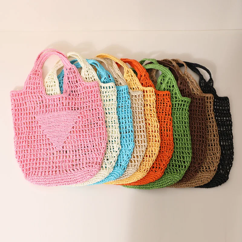 Bolsos de mano informales de paja hueca para mujer, bolsos de hombro tejidos de papel de diseñador, bolso de mano grande de playa de Color caramelo, 2023