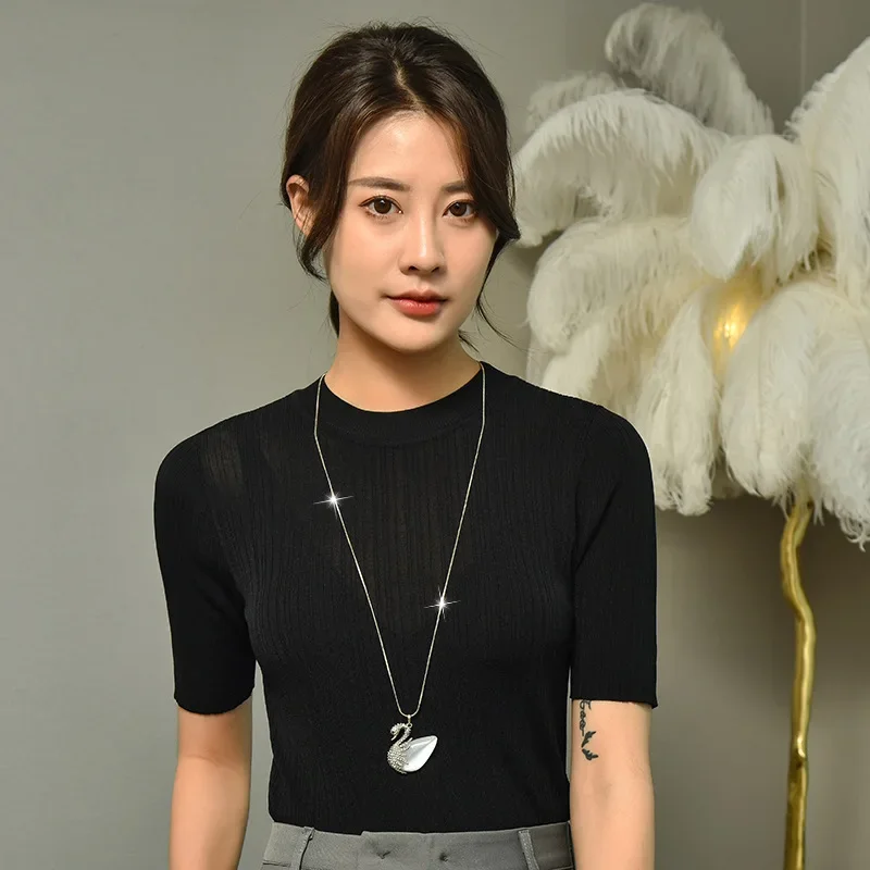 Nuovissima catena maglione cigno, ciondolo cigno occhio di gatto femminile, collana lunga autunnale e invernale, accessori eleganti e versatili