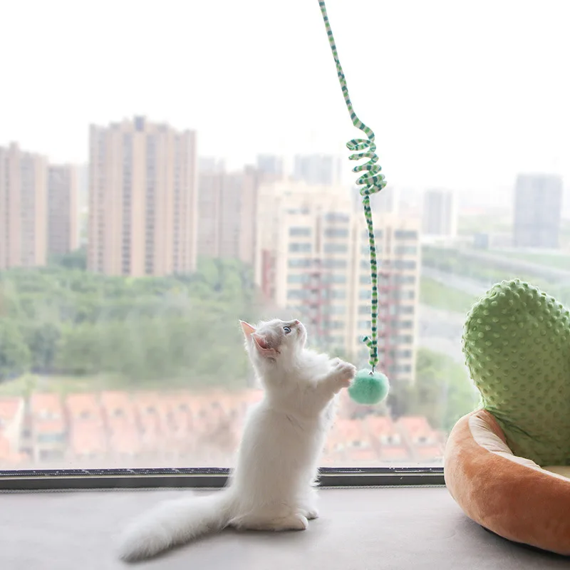 

Hot Sale Hanging Door New Cat Toy Funny Self-hey Automatic Scratch Rope Cat Elastic Rope with Bell Ball Toy Supplies