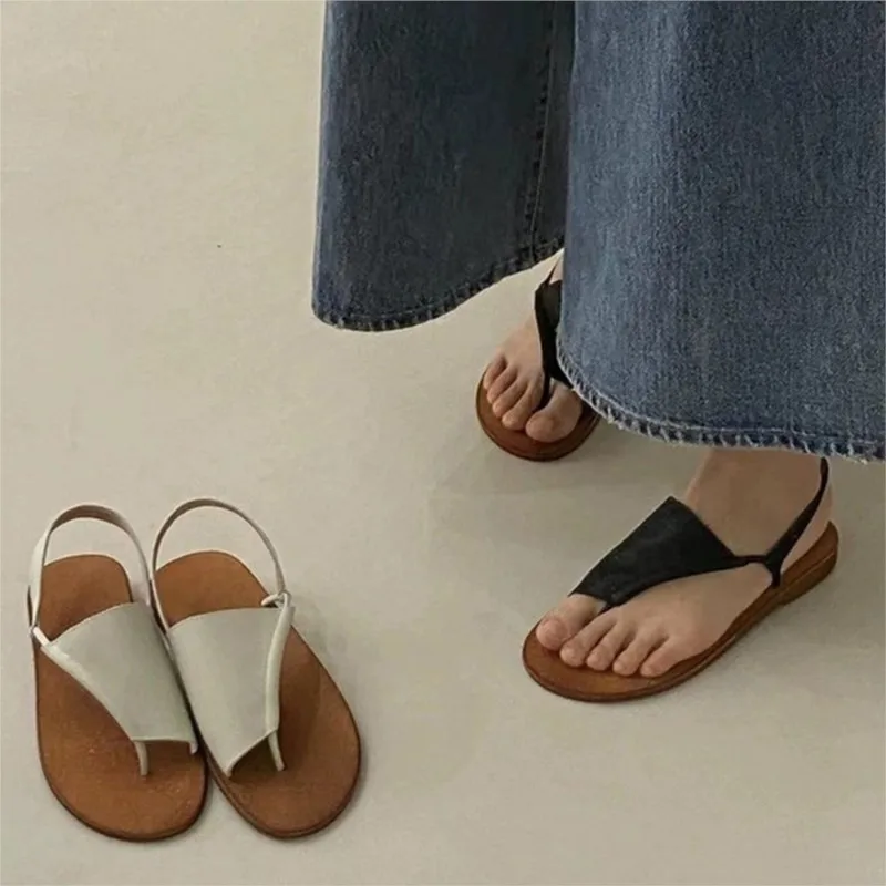 

French leather simple flat set toe Roman sandals women's summer new beach leisure foot outside to wear sandals
