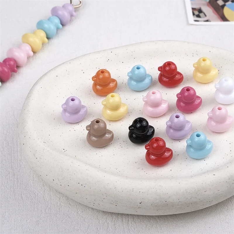 

Wholesale 200pcs/lot color print animals cartoon Duck shape acrylic straight hole beads diy jewelry garment hair accessory