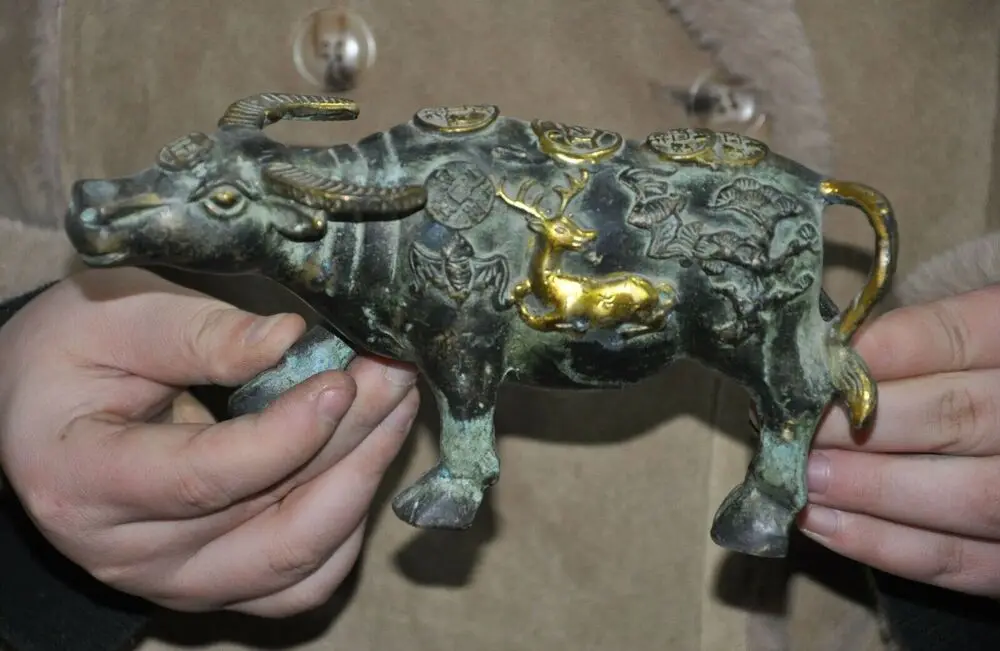 

Ancient Chinese bronze Gilt Feng Shui wealth lucky animal ox cattle statue