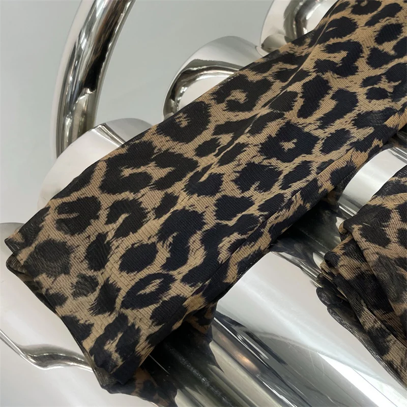 Abito da donna 2026 Primavera nuovo mini abito elastico Stampa leopardata girocollo abito corto Abiti da festa con abito avvolgente sui fianchi irregolari