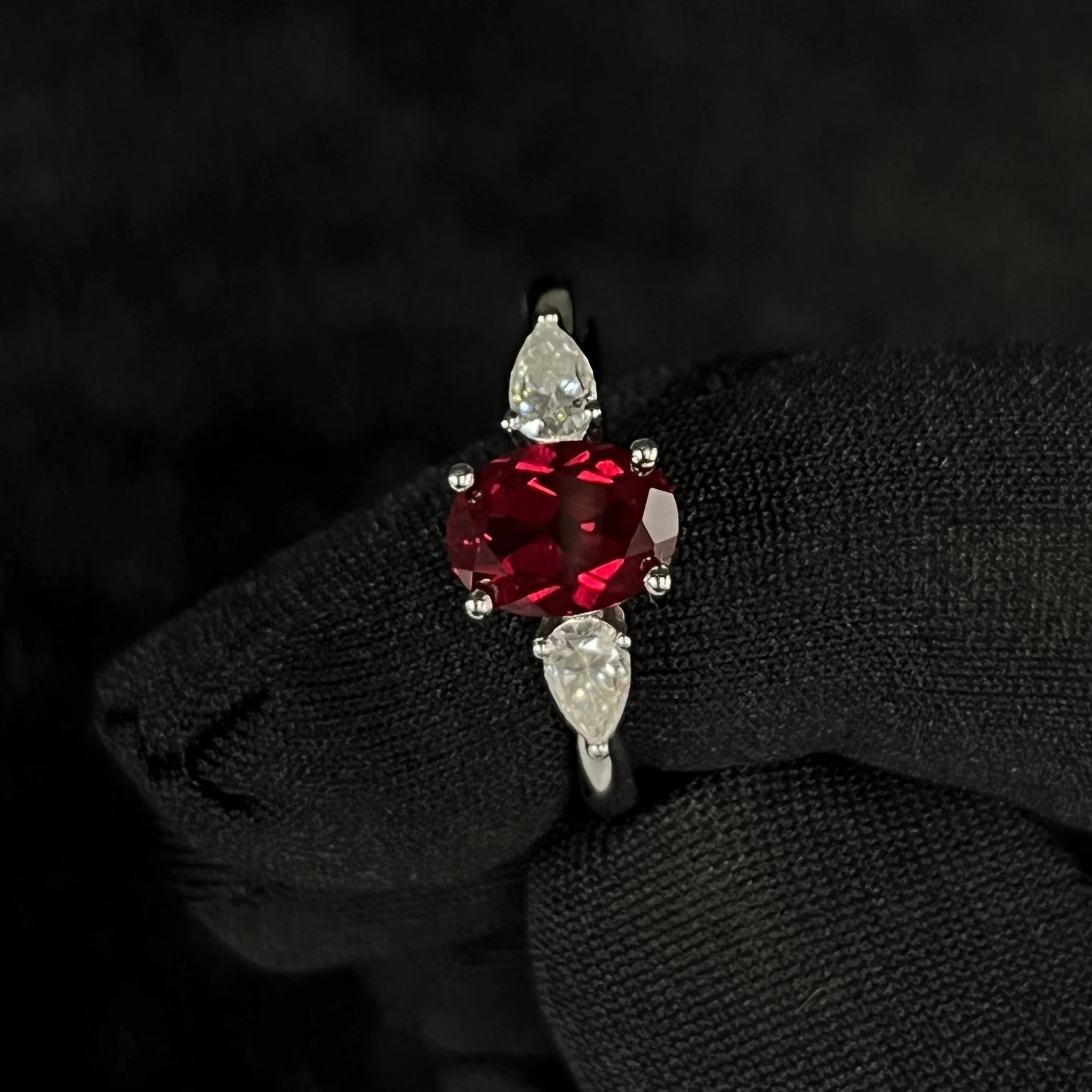 1.8 carat cultured ruby S925 sterling silver women’s ring with Moissanite inlay, sophisticated tri-stone design.