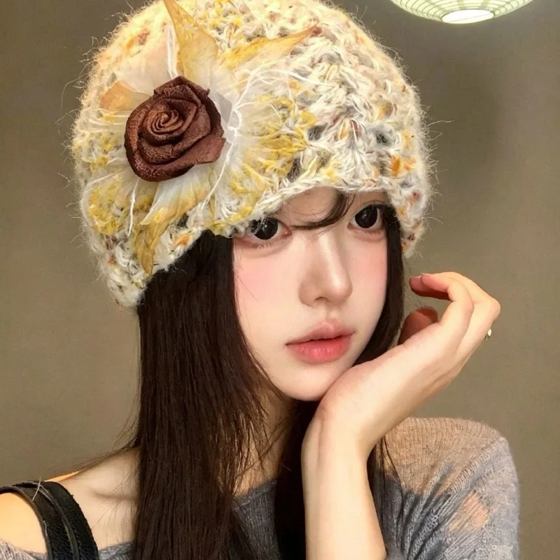 Three-dimensional hollow flower bag hat women's autumn and winter big head Korean version face wool hat knitted travel hat