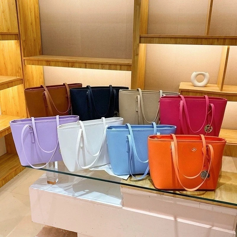 

Женская сумка Totte: стильная, универсальная сумка через плечо большой вместимости для ручной переноски.