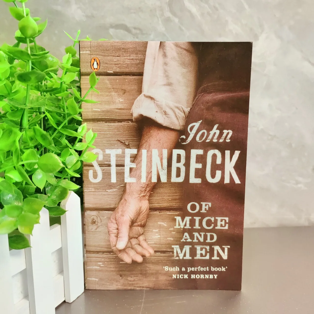 

The Original English Novel Between Mice and Men by John Steinbeck