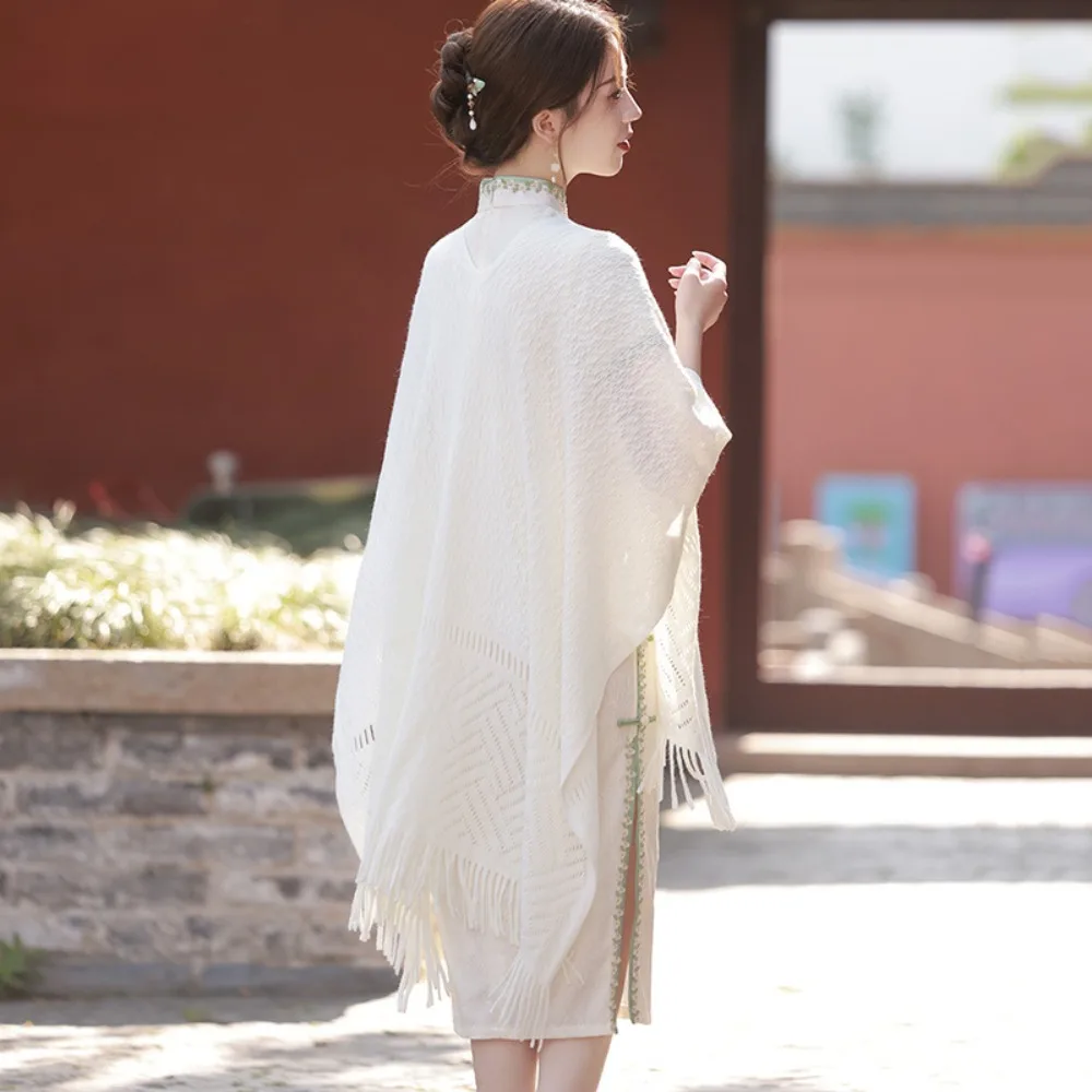 جوفاء محبوك العرقية نمط شال السفر شيونغسام عباءة العباءات معاطف النساء السترات الشارع الشهير الجنية موضة الملابس الملابس