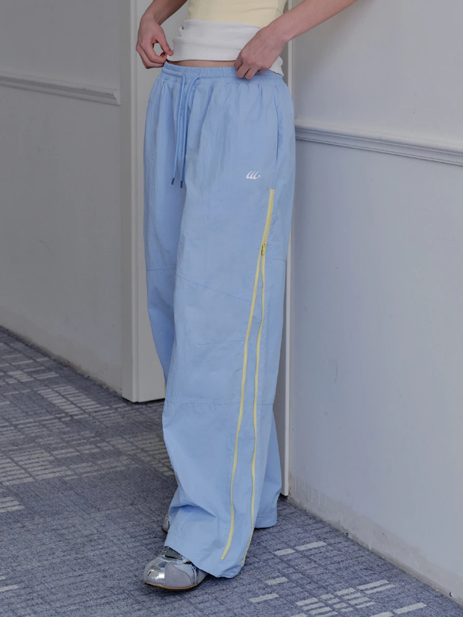 Al aire libre ligero a prueba de viento cremallera Qui Dry deportes Casual Dstring pantalones primavera paracaidista pantalones sueltos de mujer Trou...