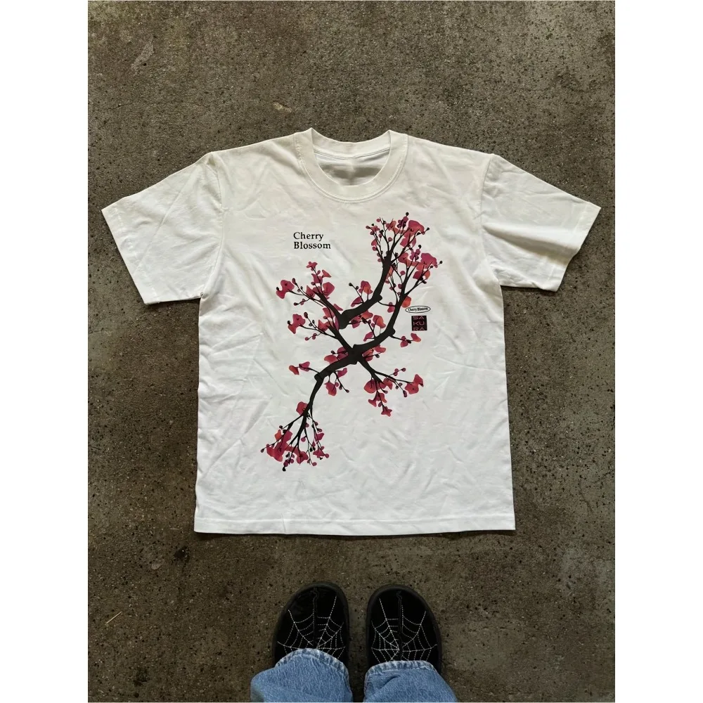 

A Vintage T-Shirt Featuring a Street-Style Cherry Blossom Tree Print, Suitable with a Round Neck