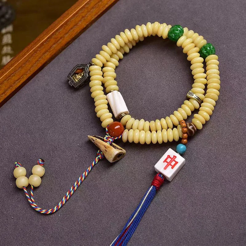 Tibetan-style returned bone bead prayer , 108 , natural red agate and glass melon beads, pendant accessory