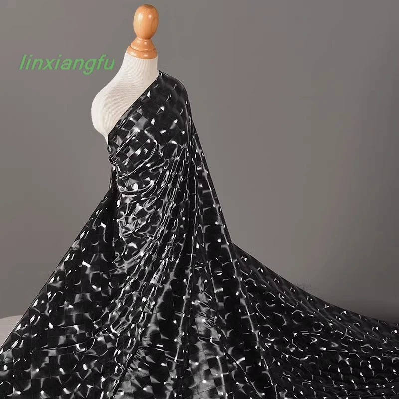Mirror black 3D cat's eye PU leather fabric, water drop plaid soft all-round elastic smooth designer fabric.
