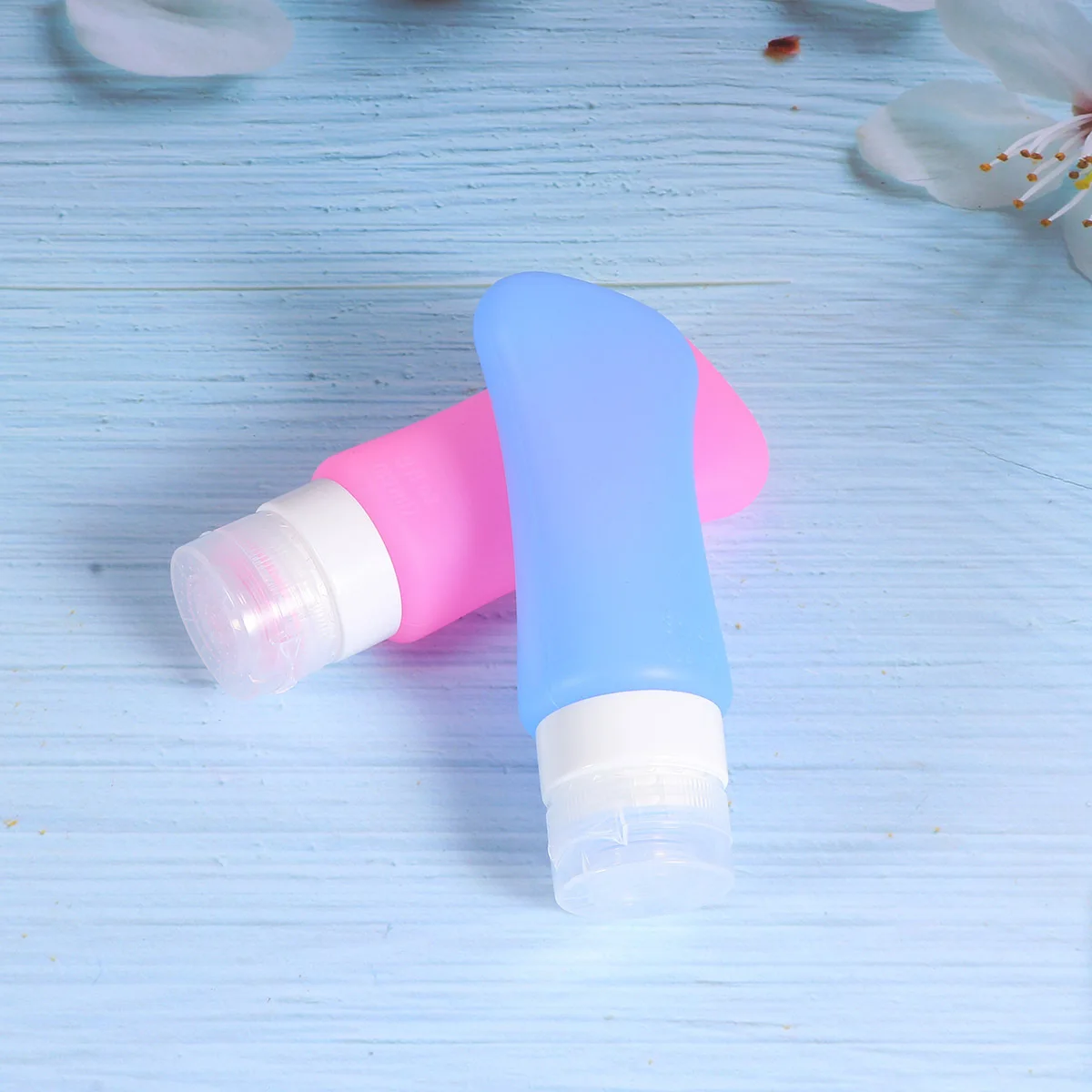 2Pcs Travel Silicone Bottles Refillable Leakproof Portable Empty Mini Dispenser Makeup Skin Pink