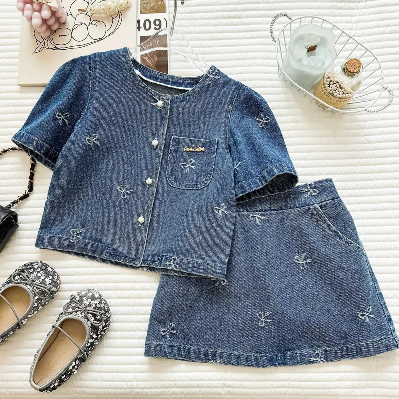 

Girls' Summer Soft Denim Suit2026Summer new heavy embroidery bow top and skirt two-piece set