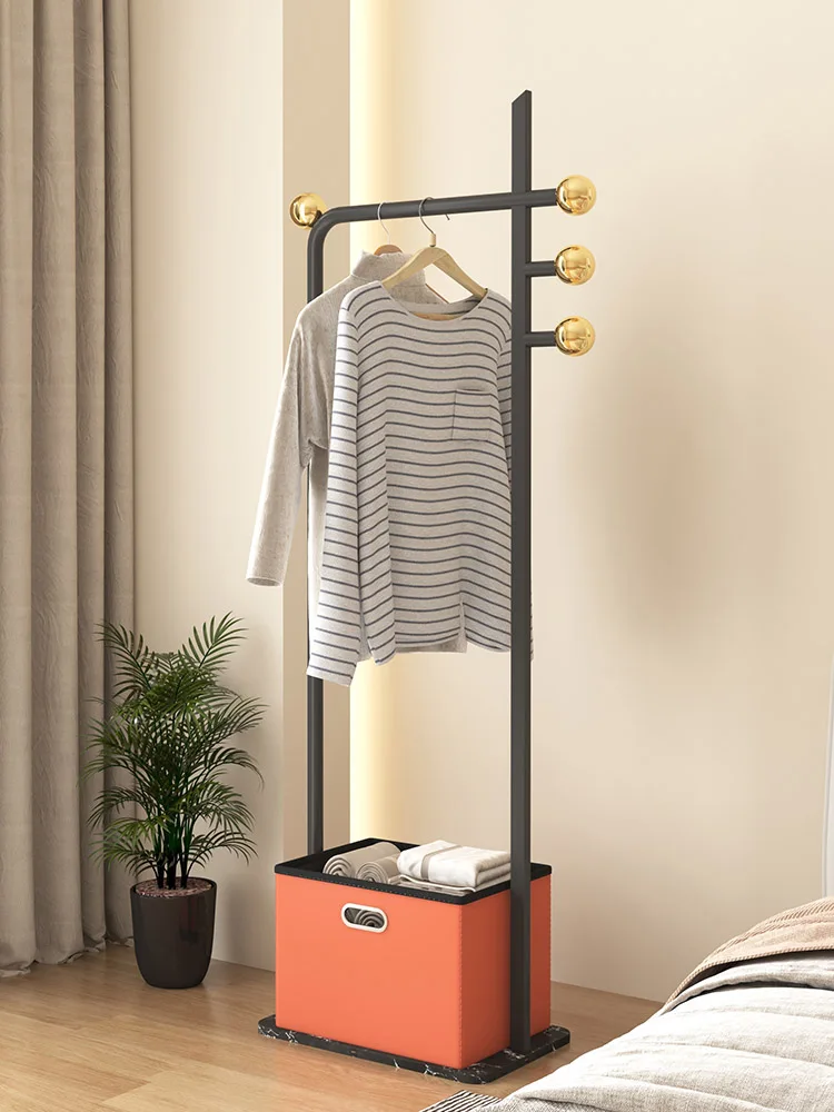 

Black floor-to-ceiling coat rack, integrated dirty clothes storage box, hanging hanger