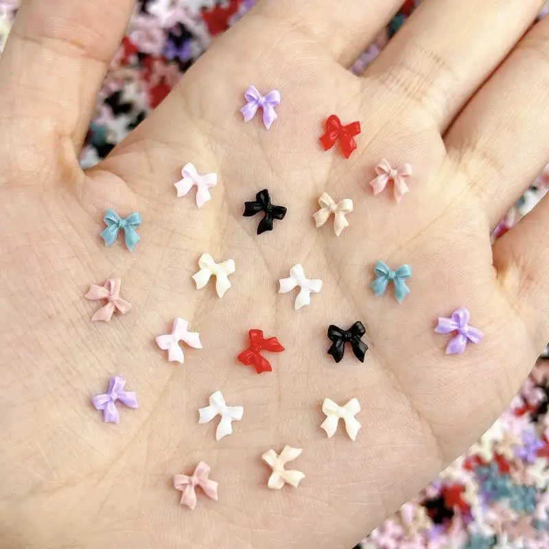 100PCS 3D เรซิ่นหวาน Mini Bowknots ตกแต่งเล็บ Kawaii สีทึบริบบิ้น Bows เล็บ Charms อุปกรณ์สําหรับเล็บ DIY