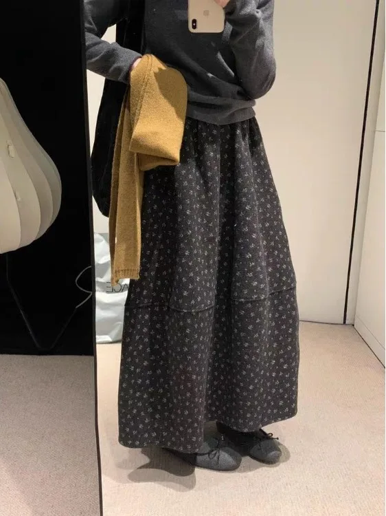 تنورة ميدي عالية الخصر على شكل حرف a مطبوعة بالزهور من الصوف للخريف والشتاء تنورة نسائية فضفاضة تناسب الخصر المرن